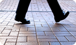 A photo of a man walking in the city