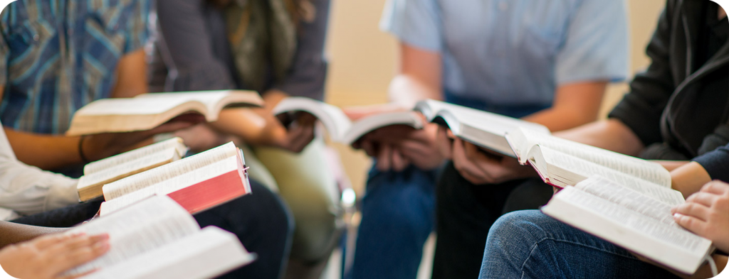 group-holding-bibles